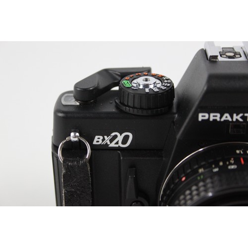 305 - Praktica BX20 SLR Film Camera w/ Pentacon Prakticar 50mm F/1.8 MC Lens  The camera is WORKING and in... 