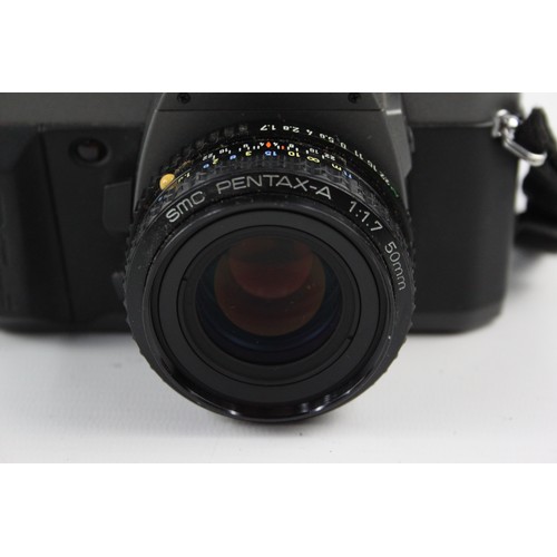 312 - Pentax P30T SLR Film Camera w/ SMC Pentax-A 50mm F/1.7 Lens  The camera is WORKING and in a good con... 