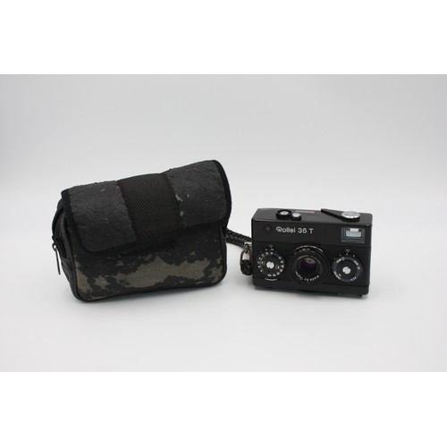 298 - Rollei 35 T Film Camera Tessar 40mm F/3.5 Lens  This camera is WORKING Winds and fires as should Ele... 