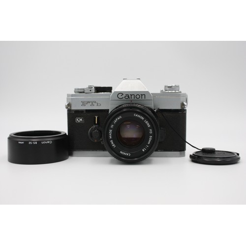 311 - Canon FTb QL SLR Film Camera w/ Canon FD 50mm F/1.8 Lens  The camera is WORKING and in a vintage con... 