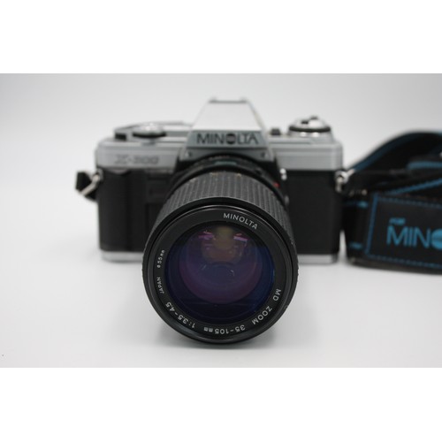 307 - Minolta X-300 SLR Film Camera w/ Minolta MD 35-105mm F/3.5-4.5 Lens  The camera is WORKING and in a ... 