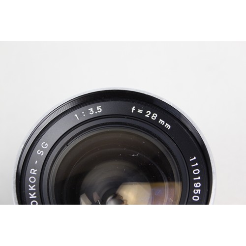 324 - Minolta Auto W.Rokkor-SG 28mm F/3.5 Lens w/ Case  Lens is MECHANICALLY WORKING Aperture blades are r... 