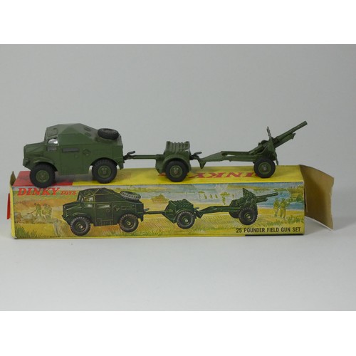 146 - Two Dinky die-cast models to include- 25 Pounder Field Gun Set 697 and an Armoured Car 670 (boxed) t... 