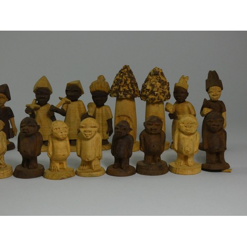 196 - A Nigerian thorn wood hand carved chess set, together with a ebonised boxwood chess set (2)