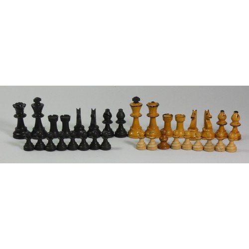 194 - A Chad Valley boxed wooden chess set,together with  a similar boxed chess set and a miniature chess ... 