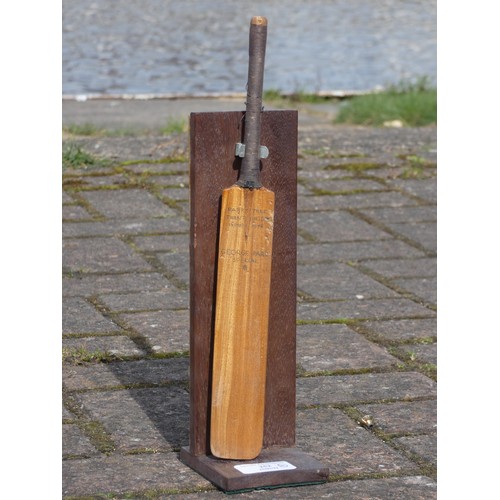 252 - A George Parr tree miniature cricket bat, with presentation inscription to the reverse, 