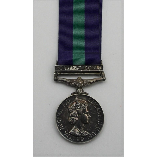 104 - A General Service medal 1918-62, with Canal Zone bar, awarded to Jnr Tech F.L. Morris, RAF.