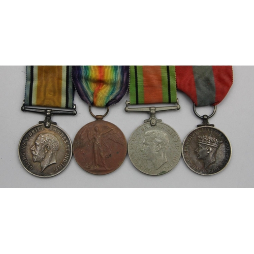 108 - A group of four, awarded to Warrant Officer 2 Charles Saunders, War 1914-18, Victory, Defence and Im... 