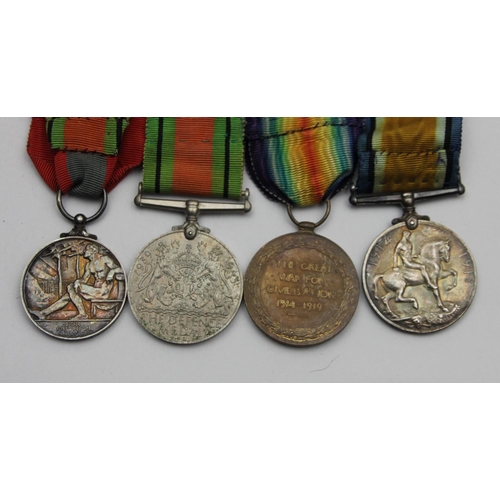 108 - A group of four, awarded to Warrant Officer 2 Charles Saunders, War 1914-18, Victory, Defence and Im... 