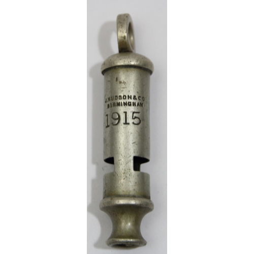 65 - A R.A. Walton military whistle, broad arrow and 1901, a J. Hudson example dated 1915 and another whi... 