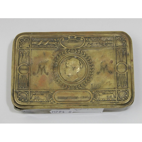 75 - A Queen Mary Christmas 1914 brass tin, together with a collection of cap badges, including the Argyl... 