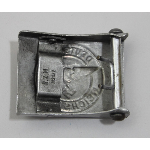 78 - German Third Reich  Reichsbahn belt buckle, stamped R.Z.M. M34/2 to the reverse, a Condor Legion sil... 