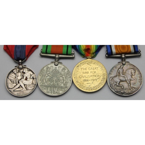 113 - A WWI/WWII group of four, awarded to Gnr W.G. Hammond, Royal Artillery, War 1914-18, Victory, Defenc... 