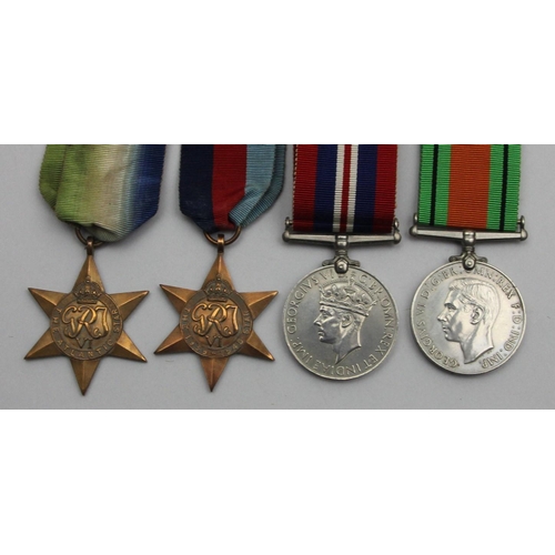 128 - A group of four WWII, War 1939-1945, Defence, 1939-1945 Star, and The Atlantic Star (4).