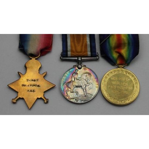 129 - A WWI group of three, awarded to Dvr. J. Curtis, Army Service Corps, 1914 Star, War 1914-1918 and Vi... 