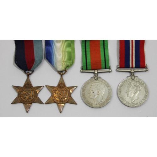 140 - A WWII group of four, War 1939-45, Defence, 1939-45 Star and the Atlantic Star