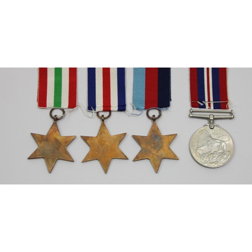 141 - A WWII group of four, awarded to J. Barton, War 1939-45, 1939-45 Star, Italy Star, France and German... 