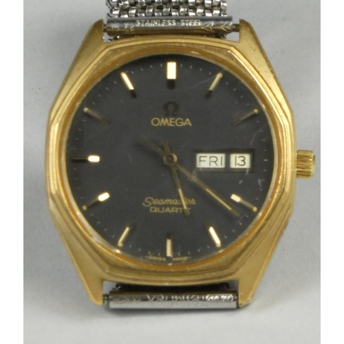 121 - Omega Seamaster; a gentleman's stainless steel quartz day/date wristwatch, the black dial with baton... 