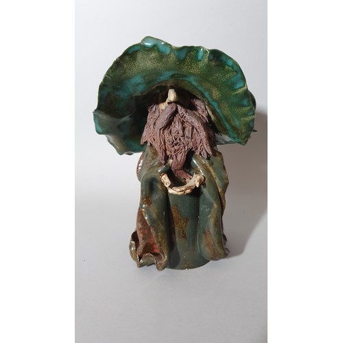 156 - Bernard Stanley Pearson (b. 1946) for Clare Craft, a pottery figure of a Viking, signed, 12 cm, an u... 