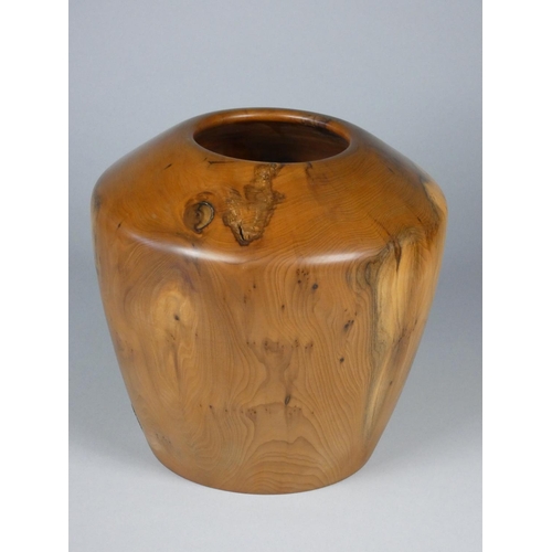 177 - Robin Wood, a collection of four turned yew wood bowls and a plate, each with carved sunrise motif t... 