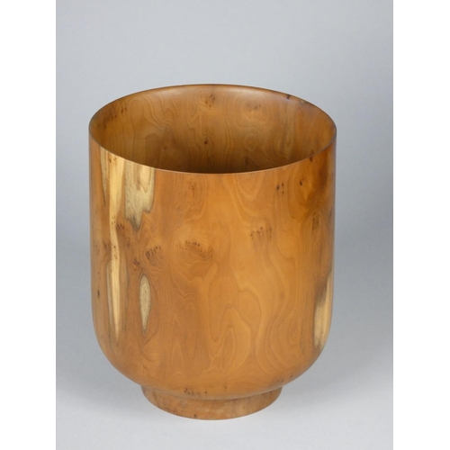 177 - Robin Wood, a collection of four turned yew wood bowls and a plate, each with carved sunrise motif t... 