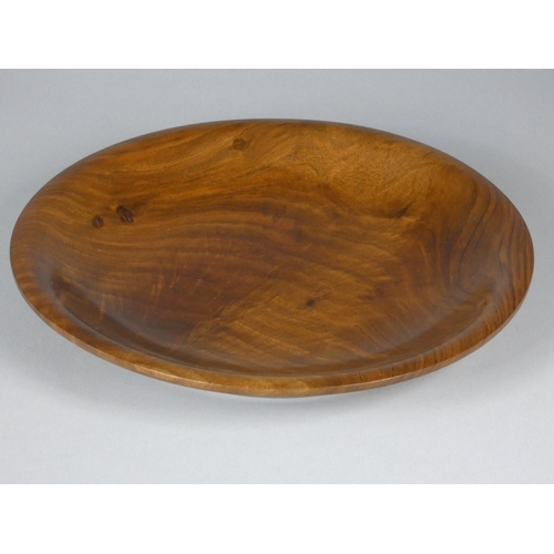 177 - Robin Wood, a collection of four turned yew wood bowls and a plate, each with carved sunrise motif t... 