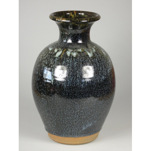 178 - Unknown, a mottled blue glazed baluster vase, height 29 cm.