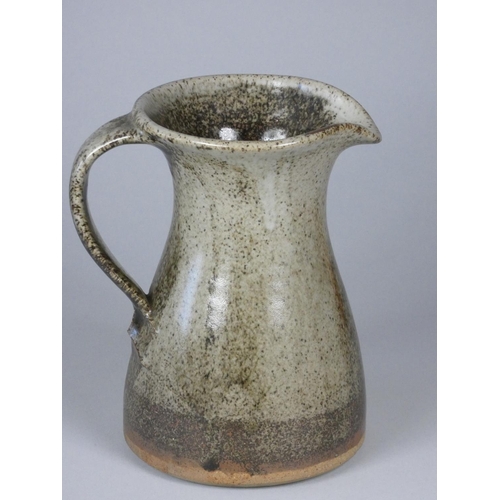 185 - Unknown, a green stoneware water jug with darker green detail, height 16.8 cm