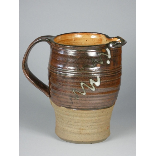 186 - Charles Bound (b.1939), a stoneware brown glazed jug with abstract design, height 20 cm