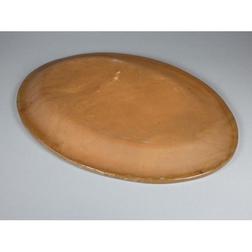 193 - Unknown, a brown glazed clay serving plate with black detail, diameter 40 cm