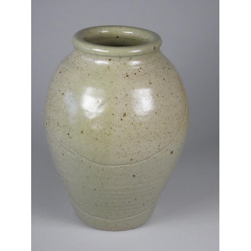 195 - Unknown, a light green stoneware glazed vase with brown details and whale carved into side, height 2... 