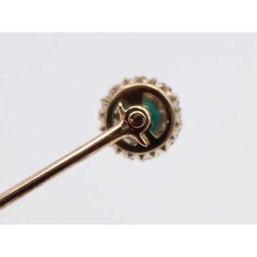 68 - A Victorian turquoise and diamond stickpin, the screw off top set with old cut stones, diameter 9mm.