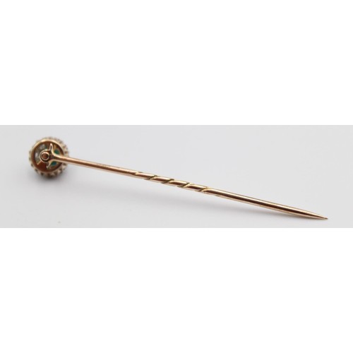 68 - A Victorian turquoise and diamond stickpin, the screw off top set with old cut stones, diameter 9mm.