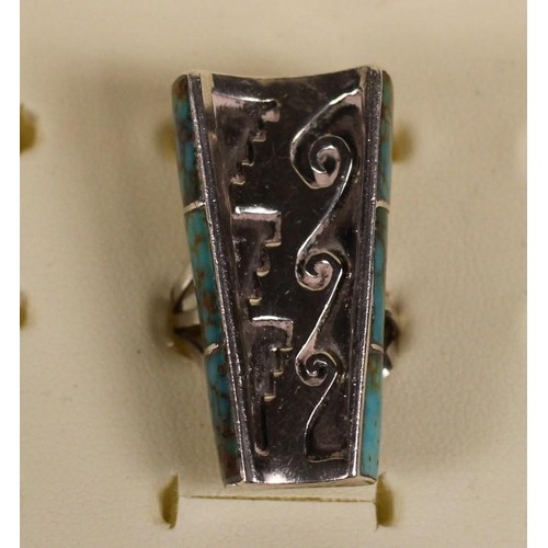 77 - Lennie Parker, a Navaho silver and turquoise ring, c.1980's with geometric decoration, size L.