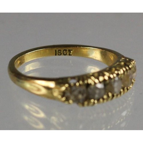 86 - An 18ct gold five stone diamond ring, claw set with old cut stones, total weight approximately 0.90c... 