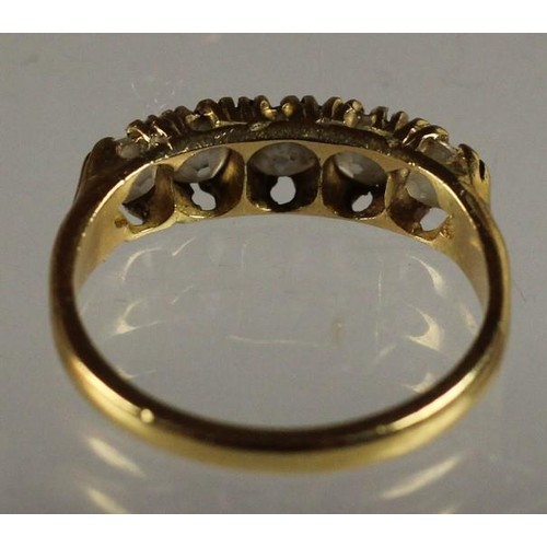 86 - An 18ct gold five stone diamond ring, claw set with old cut stones, total weight approximately 0.90c... 