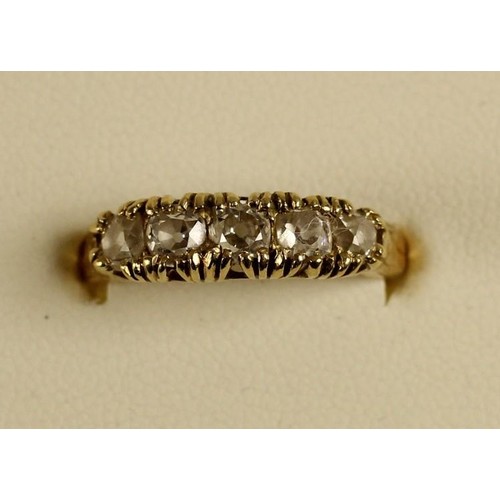 86 - An 18ct gold five stone diamond ring, claw set with old cut stones, total weight approximately 0.90c... 