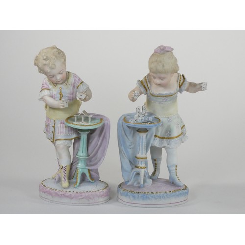 132 - A 19th century Continental pair of cold painted bisque figures, depicting a boy and girl, 36cm, toge... 