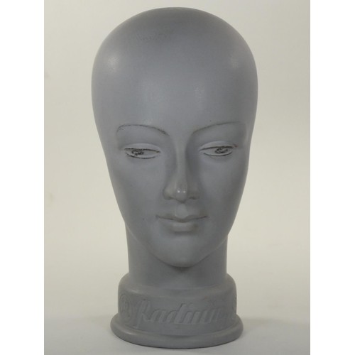 138 - A pottery head of a female, impress RADIUM, 30cm.