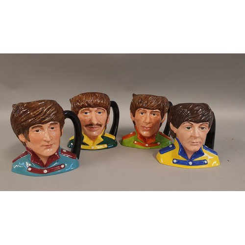 143 - Royal Doulton set of Character Jugs The Beatles: Comprising John Lennon D6725, Paul McCartney D6724,... 