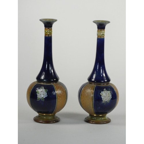 144 - A pair Doulton Lambeth stoneware vases, by Maud Bowden, pattern 8832, with slender necks, impressed ... 