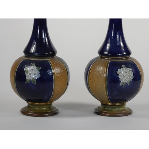 144 - A pair Doulton Lambeth stoneware vases, by Maud Bowden, pattern 8832, with slender necks, impressed ... 