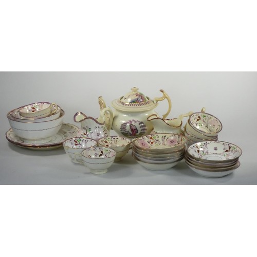 146 - A Sunderland lustre part tea service, comprising tea pot, 9 cups (2 lacking handles), 11 saucers, 2 ... 