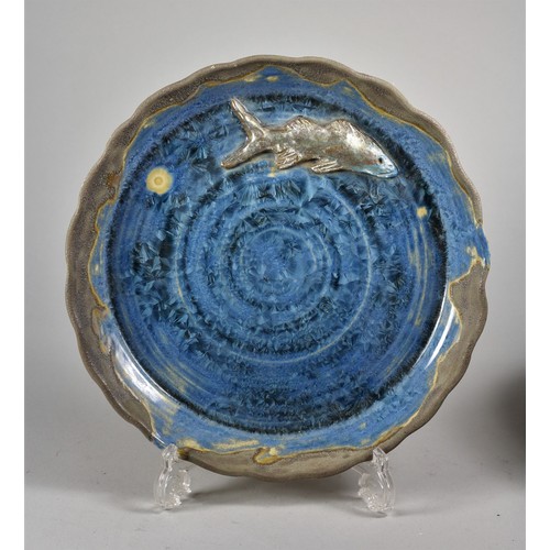 221 - Louis Richwald, a blue glazed plate, with applied fish, engraved on base, diameter 26 cm, together w... 