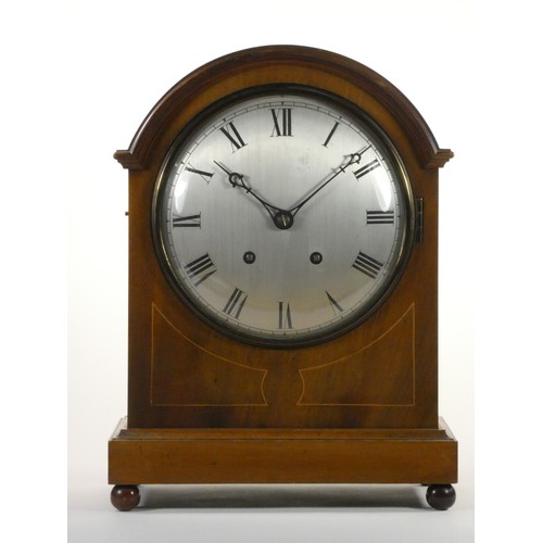 267 - An Edwardian mahogany and boxwood strung mantle clock, with silvered dial, the movement by Winterhal... 