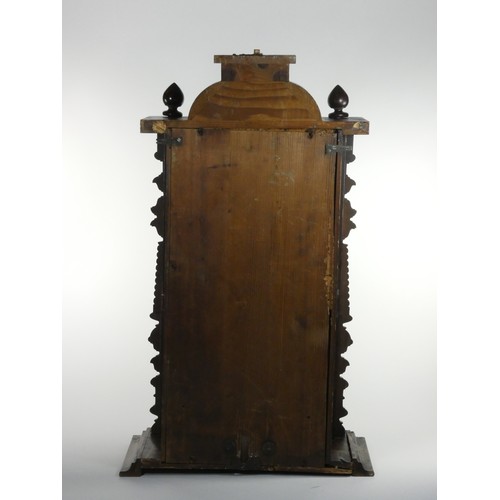 270 - Gustave Becker, a Vienna style walnut wall clock, with turned supports, pendulum, key, 90 cm.