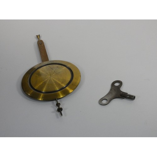 270 - Gustave Becker, a Vienna style walnut wall clock, with turned supports, pendulum, key, 90 cm.