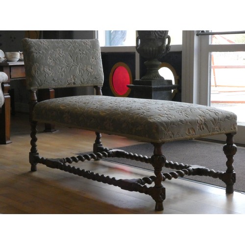 328 - An Edwardian oak day bed, with upholstered base and back, barley twist supports and stretchers, 132 ... 