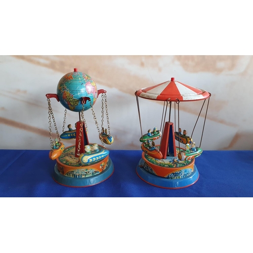 360 - Two German tin plated fairground carousels, printed decoration and Made in Western Germany, 16 x 13 ... 