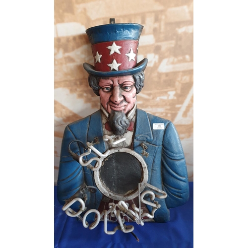 362 - A cast ion and neon lit Uncle Sam wall lamp, A/F, 67 cm.